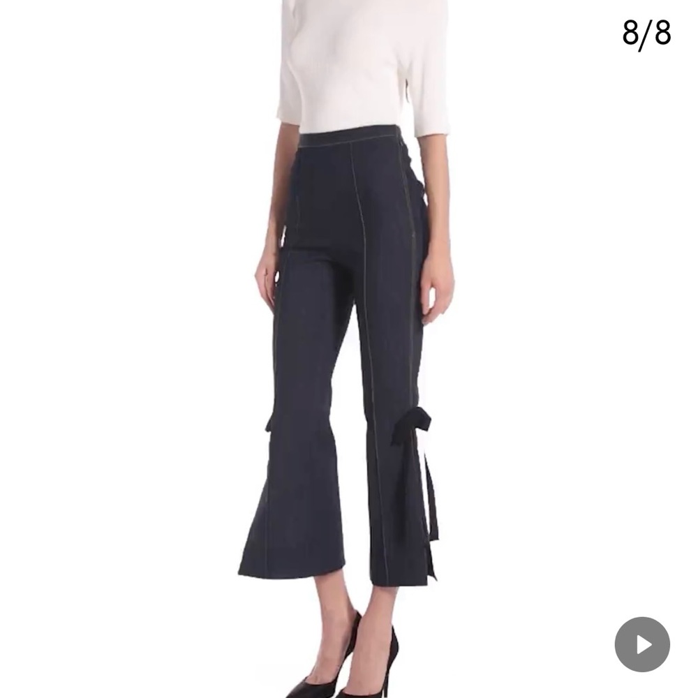 Cinq a Sept denim "Lou" pants in stretch denim, embellished with bows